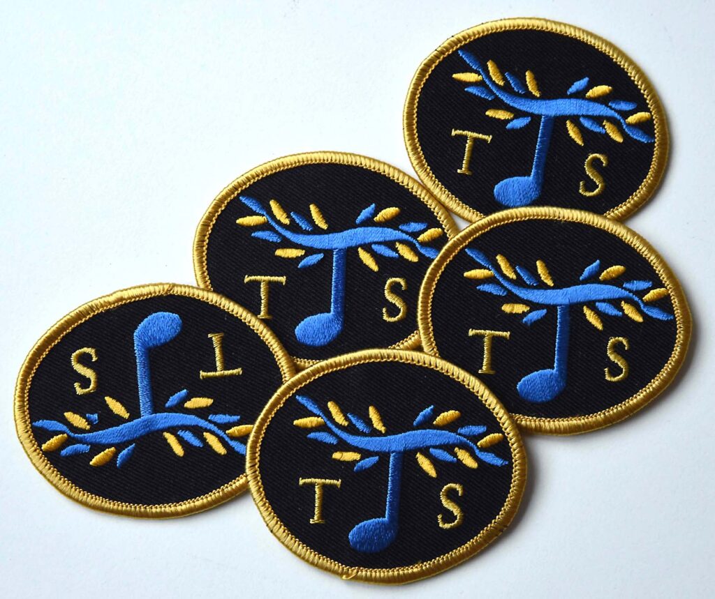 Taubesällskapets märke